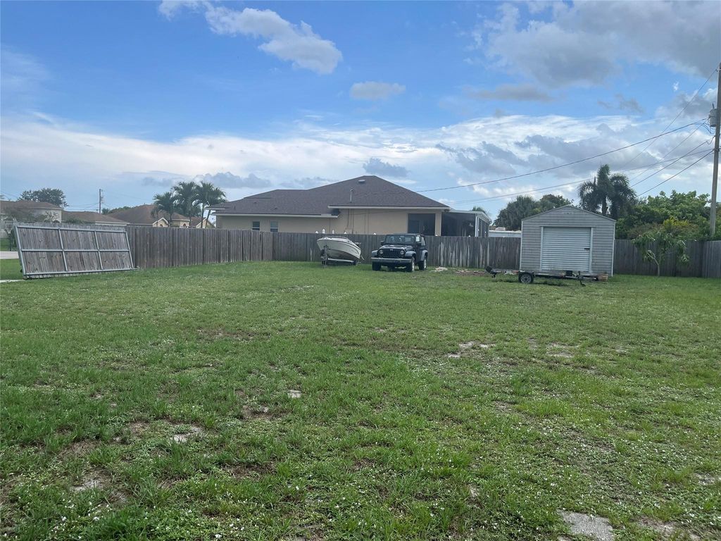 Photo of 4122 SW Baird Street, Port Saint Lucie, FL 34953 (MLS # F10506191)