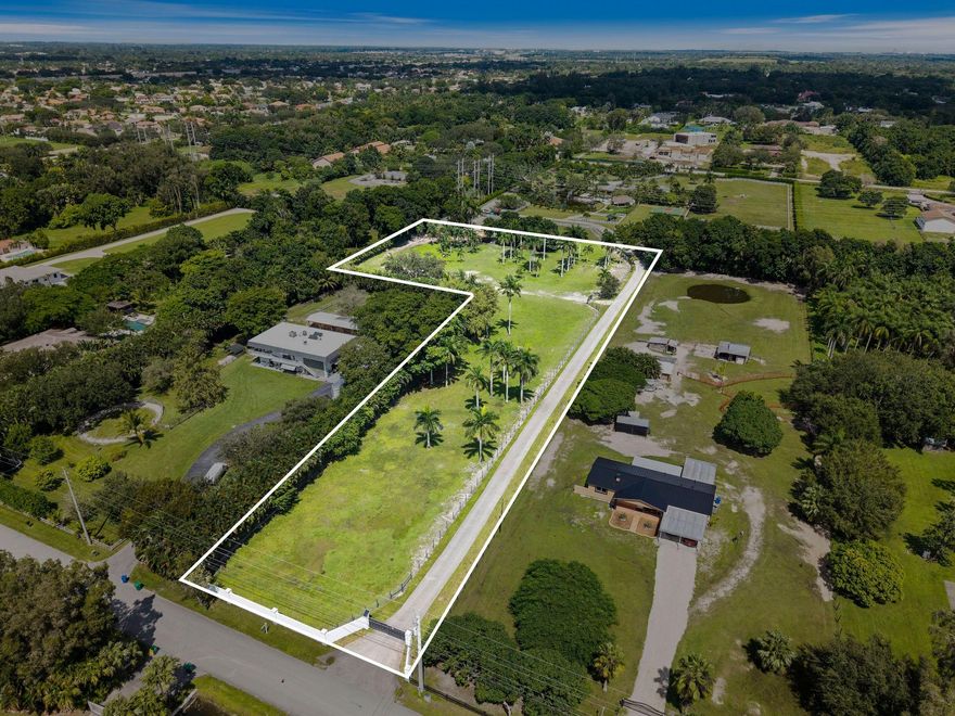 Ready-to-build 2.8-acre lot in the prestigious Sunshine Ranches of Southwest Ranches! Fully fenced with a long private driveway, this cleared and exclusive parcel offers the perfect setting to create your dream estate of 12,000+ sq ft with space for pool, stables, and more. Rarely available and offering unmatched privacy, this property is one of the last opportunities to build in Sunshine Ranches while still enjoying easy access to major highways, shopping, and top-rated schools.
