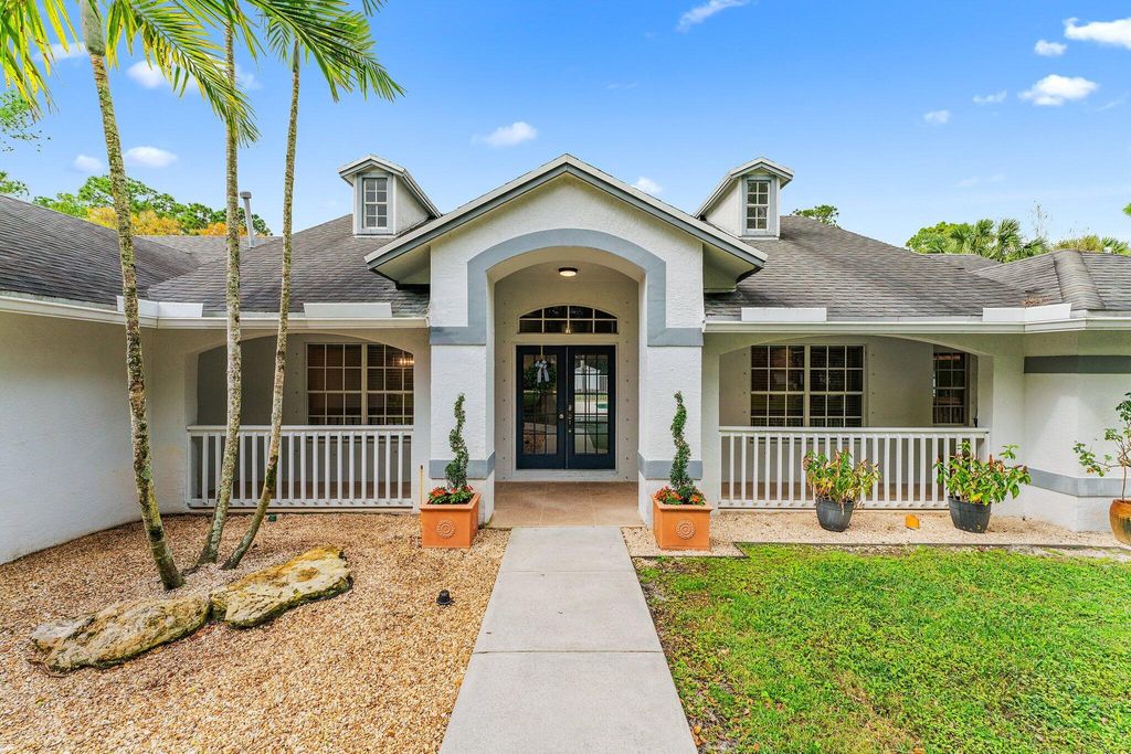 Photo of 17141 126th Terrace N, Jupiter, FL 33478 (MLS # R10954084)