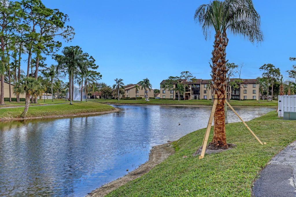 Photo of 530 Shady Pine Way #D1, Greenacres, FL 33415 (MLS # R10961106)