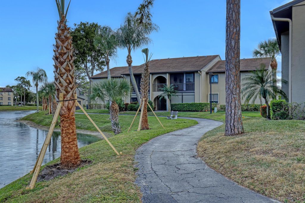 Photo of 530 Shady Pine Way #D1, Greenacres, FL 33415 (MLS # R10961106)