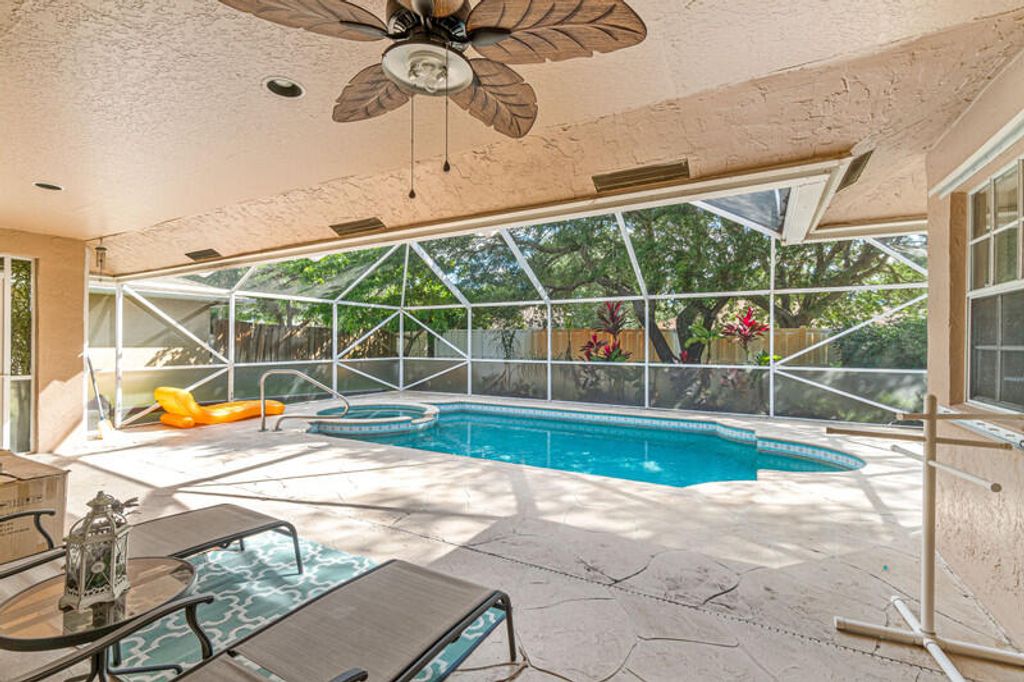 Photo of 1480 Hollyhock Road, Wellington, FL 33414 (MLS # B26007307)