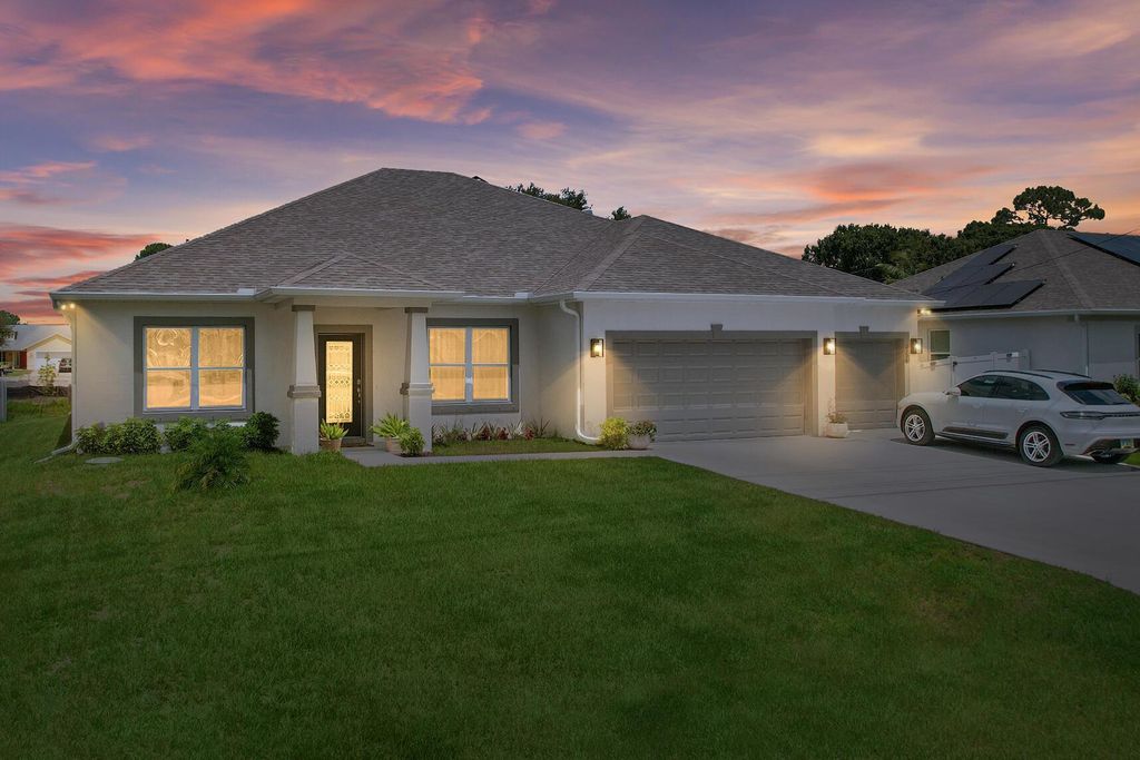 Photo of 2306 SW Pamona Street, Port Saint Lucie, FL 34953 (MLS # R11109367)