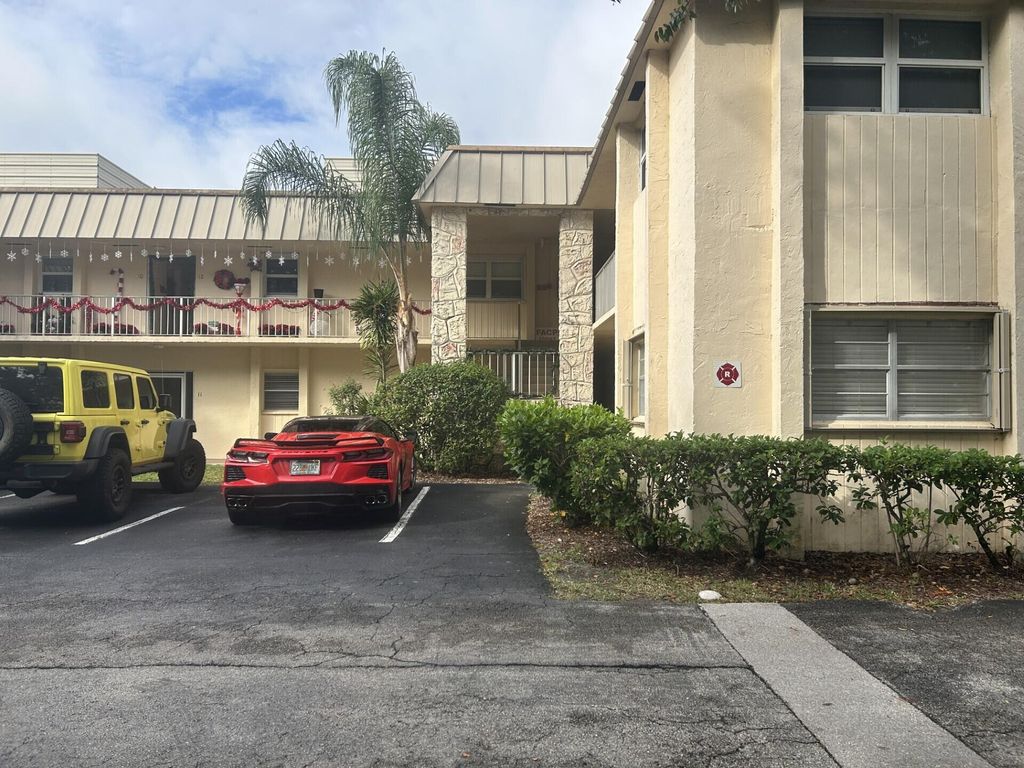 Photo of 10693 N Military Trail #18, Palm Beach Gardens, FL 33410 (MLS # R11146551)