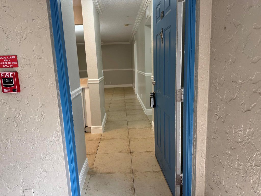 Photo of 1601 Windorah Way #D, West Palm Beach, FL 33411 (MLS # R11128039)