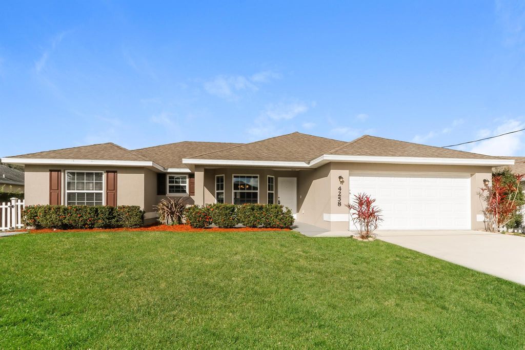 Photo of 4258 SW Tuscol Street, Port Saint Lucie, FL 34953 (MLS # R11132133)