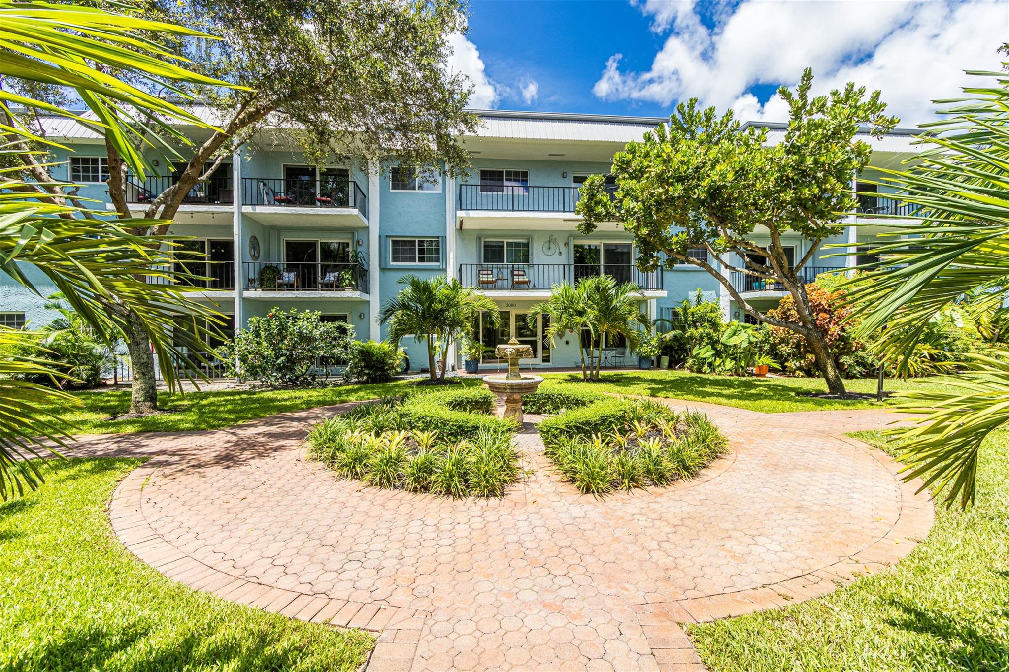 Welcome to your private oasis in the heart of Wilton Manors! This beautifully remodeled first-floor corner unit offers unmatched privacy and serene views of lush and tropical landscaping from your own spacious patio. Perfect for morning coffee or evening unwinding.
Step inside to an open-concept kitchen featuring sleek granite countertops, stainless steel appliances, and modern cabinetry, an ideal setting for entertaining or relaxed everyday living. The bathrooms are tastefully updated, and the generously sized bedrooms offer ample closet space for all your needs. Impact windows throughout. Exceptional walkability to shops, dining, and nightlife that Wilton Drive offers. This apartment checks all the boxes for comfort, style, and location. Don’t miss out, schedule your tour today!
