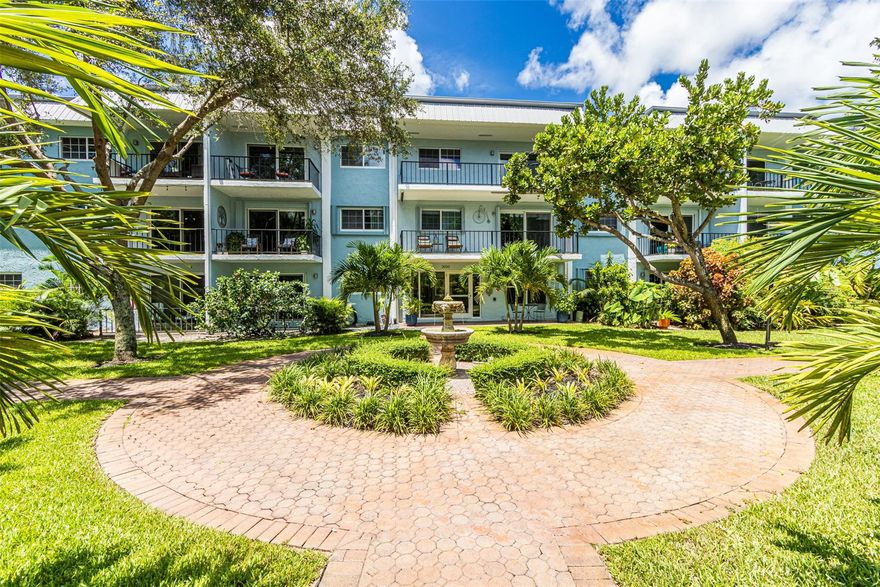 Welcome to your private oasis in the heart of Wilton Manors! This beautifully remodeled first-floor corner unit offers unmatched privacy and serene views of lush and tropical landscaping from your own spacious patio. Perfect for morning coffee or evening unwinding.
Step inside to an open-concept kitchen featuring sleek granite countertops, stainless steel appliances, and modern cabinetry, an ideal setting for entertaining or relaxed everyday living. The bathrooms are tastefully updated, and the generously sized bedrooms offer ample closet space for all your needs. Impact windows throughout. Exceptional walkability to shops, dining, and nightlife that Wilton Drive offers. This apartment checks all the boxes for comfort, style, and location. Don’t miss out,  schedule your tour today!