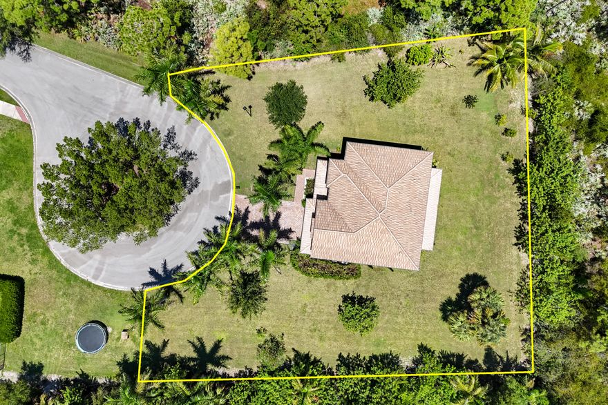 This is a 1 of 1! The only home in the gated community of Copperleaf, where you literally have the entire cul-de-sac to yourself! Built in 2016 with CBS construction, this 4 bedroom, 3.5 bath home offers 3,279 A/C SqFt on a beautifully landscaped 0.55-acre lot, surrounded by a tranquil nature preserve for unmatched privacy and natural beauty. Inside, step into a sophisticated, European design, which exudes timeless elegance with upgraded trim work throughout, including crown molding, detailed window casings, and classic wainscoting. The main level features multiple living and dining areas in a semi-open floor plan to provide ample space for entertaining, but also the versatility for more formal and intimate gatherings if preferred. Upstairs you will find rich, cherry laminate flooring  leading to all 4 bedrooms, plus 3 baths, and a spacious secondary living area, ideal for a media room, guest retreat, or play space. The master bedroom suite is substantial in size, and carries through the fine detail work found throughout the home, and also offers dual walk-in closets, and a large bath with dual vanities. Regardless of where you are in the home, you will constantly feel surrounded by green space and emersed in nature, making it hard to believe you actually live inside a gated HOA neighborhood. Designed for comfort and longevity, the home includes two recently replaced A/C units (2022 & 2023) and a generous 2.5-car garage offering ample room for storage and parking. As part of the Copperleaf community, residents enjoy an exceptional array of amenities including a newly renovated clubhouse, resort-style pool, state-of-the-art fitness center, playground, library, and courts for tennis, basketball, and pickleball. The neighborhood is also zoned for "A" rated schools, making it an ideal setting for both luxury living and educational excellence. Combining refined European design, thoughtful upgrades, and a premier location within a vibrant, amenity-rich community, this one-of-a-kind property offers the perfect blend of elegance, comfort, and privacy.
