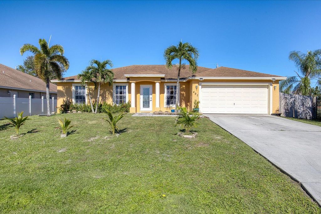 Photo of 497 SW Lacroix Avenue, Port Saint Lucie, FL 34953 (MLS # R11040616)
