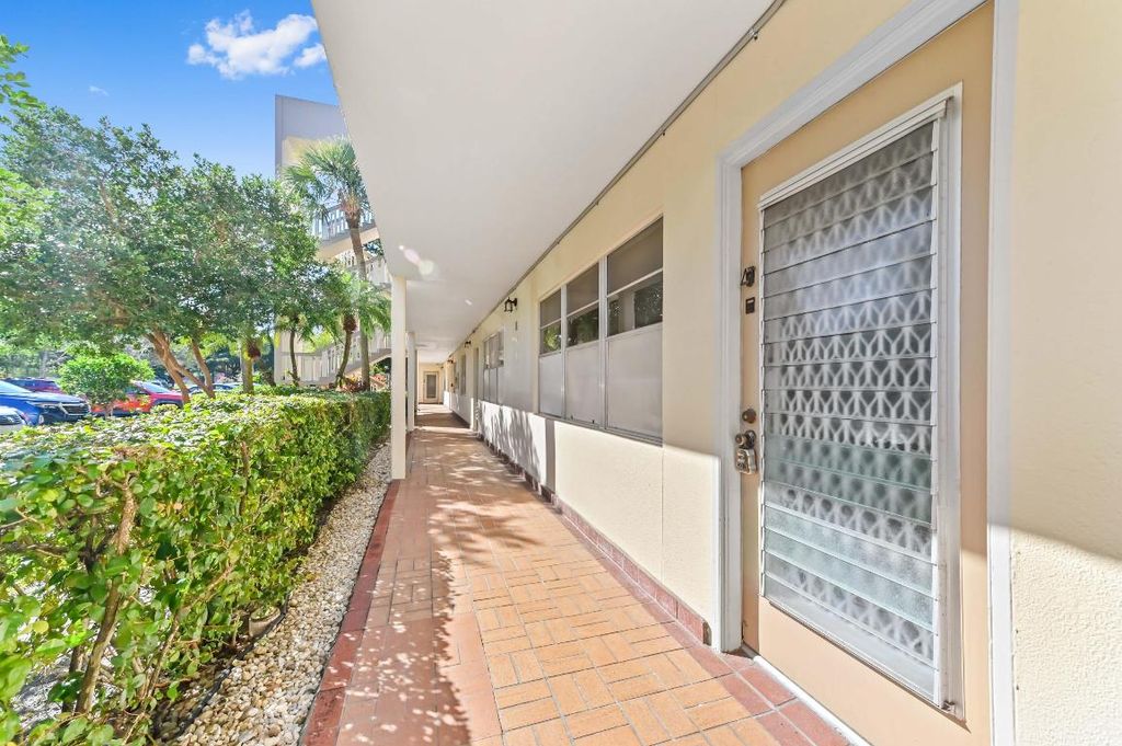 Photo of 2103 Lucaya Bend #E1, Coconut Creek, FL 33066 (MLS # R11157896)