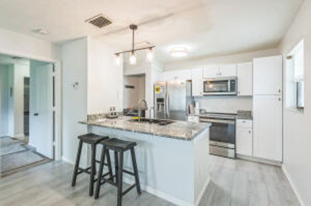 Photo of 6537 SE Federal Highway #202, Stuart, FL 34997 (MLS # B26023965)
