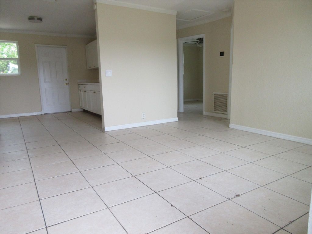 Photo of 1548 W 10th Street, Riviera Beach, FL 33404 (MLS # F10447502)