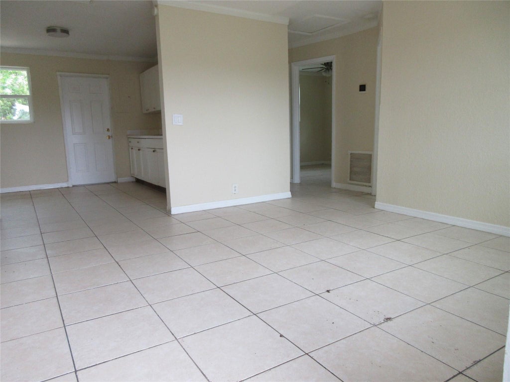 Photo of 1548 W 10th Street, Riviera Beach, FL 33404 (MLS # F10447502)
