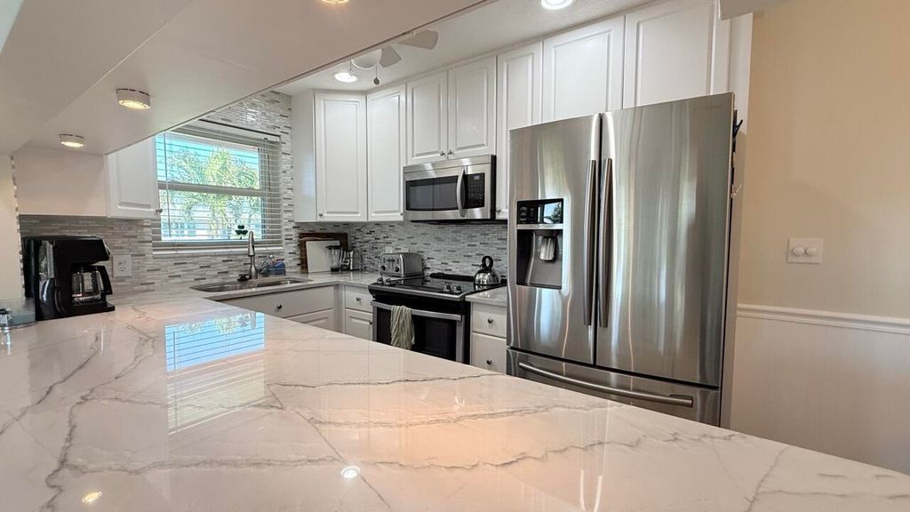 Photo of 150 High Point Boulevard #D, Boynton Beach, FL 33435 (MLS # R11076803)