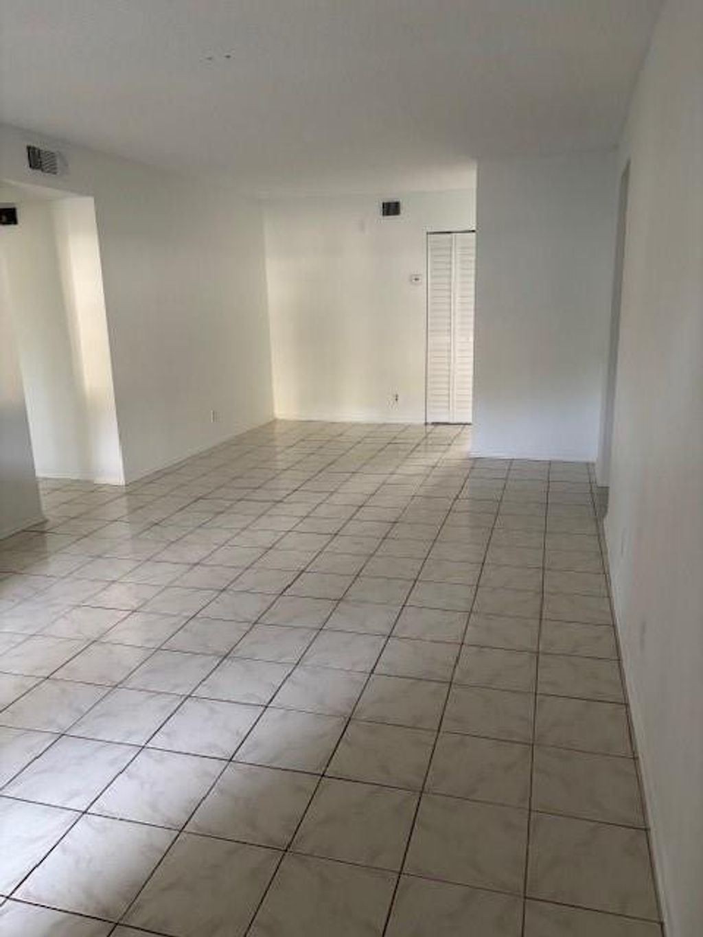 Photo of 501 Gardens Drive #101, Pompano Beach, FL 33069 (MLS # F10555980)