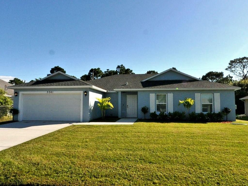 Photo of 3061 SW Briggs Street, Port Saint Lucie, FL 34953 (MLS # R11151938)