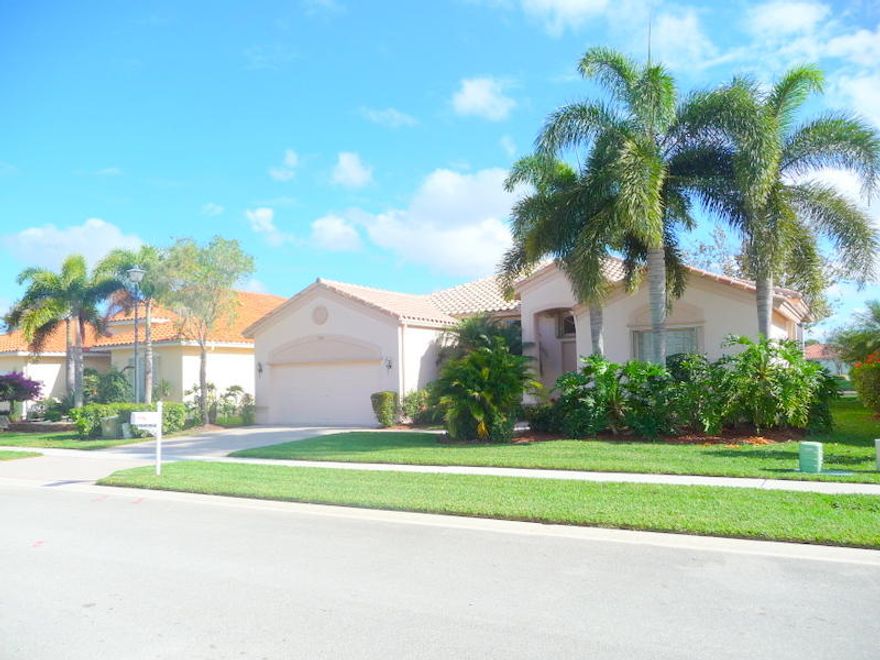 Beautiful well maintained lightly used 3/2/1  2350 lsf/3105 tsf lakefront home centered on a prime street location. It's Celestia floor plan with dual patios, split bedrooms, a formal dining room, a laundry room, a family room, a living room, high ceilings, and an extended garage is a popular model. The home has a spacious kitchen with 42'' cabinets, granite countertops with back splash, and a breakfast area. Accordion Hurricane shutters surround the property. The floors are ceramic tile and carpet. There is also an intercom with speakers ,7 fans, an alarm system, a central vacuum system, and plenty of closet space. Don't forget to see the 36000 sft newly renovated Bellaggio Clubhouse and Cafe with indoor and outdoor pools, a showroom, tennis and bocce, a billiard room, cards, and a  gymn. tennis and bocci courts,billiard room,etc.