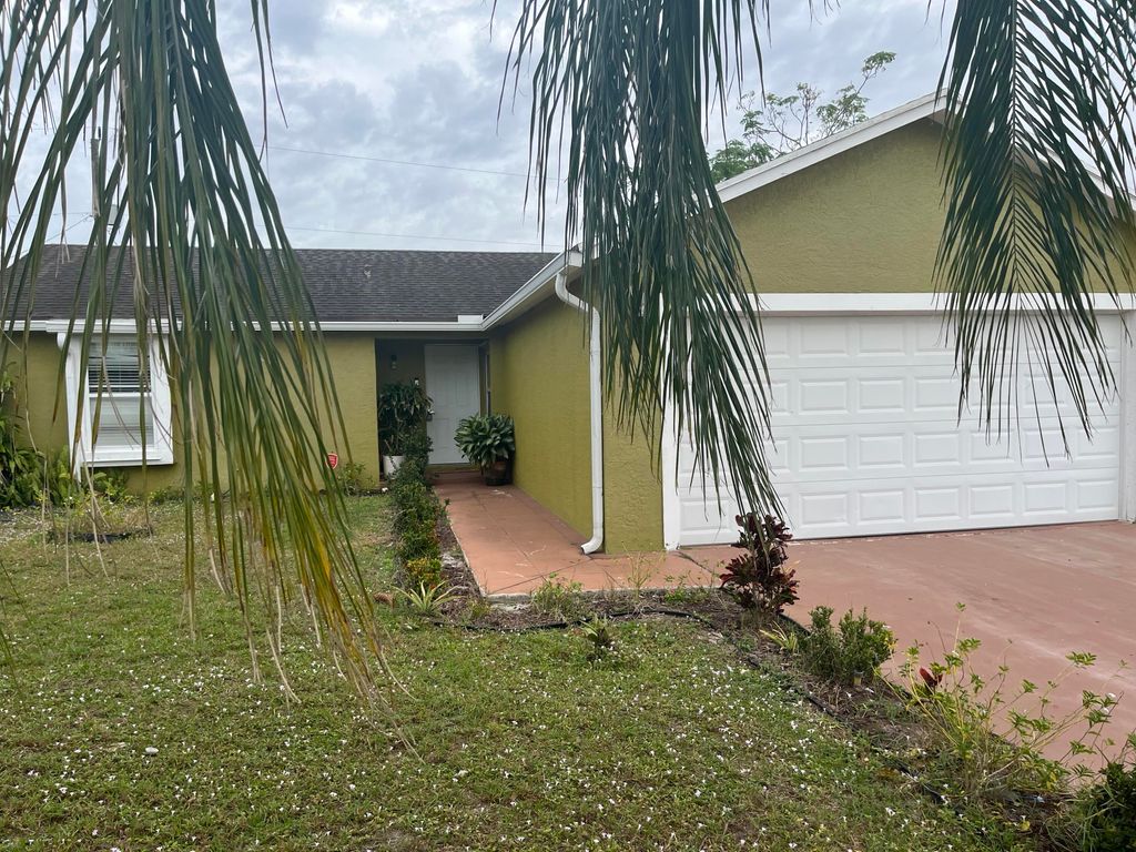 Photo of 4189 SW Alice Street, Port St Lucie, FL 34953 (MLS # R10860906)