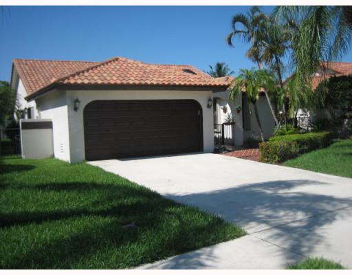 Single family home in Central Boca, close to everything 3 full baths, split bedroom plan. Community offers heated Pool!! Lawn and internet included thru HOA