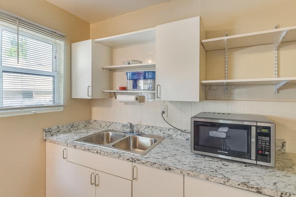 Photo of 1933 Taylor Street, Hollywood, FL 33020 (MLS # F10554369)