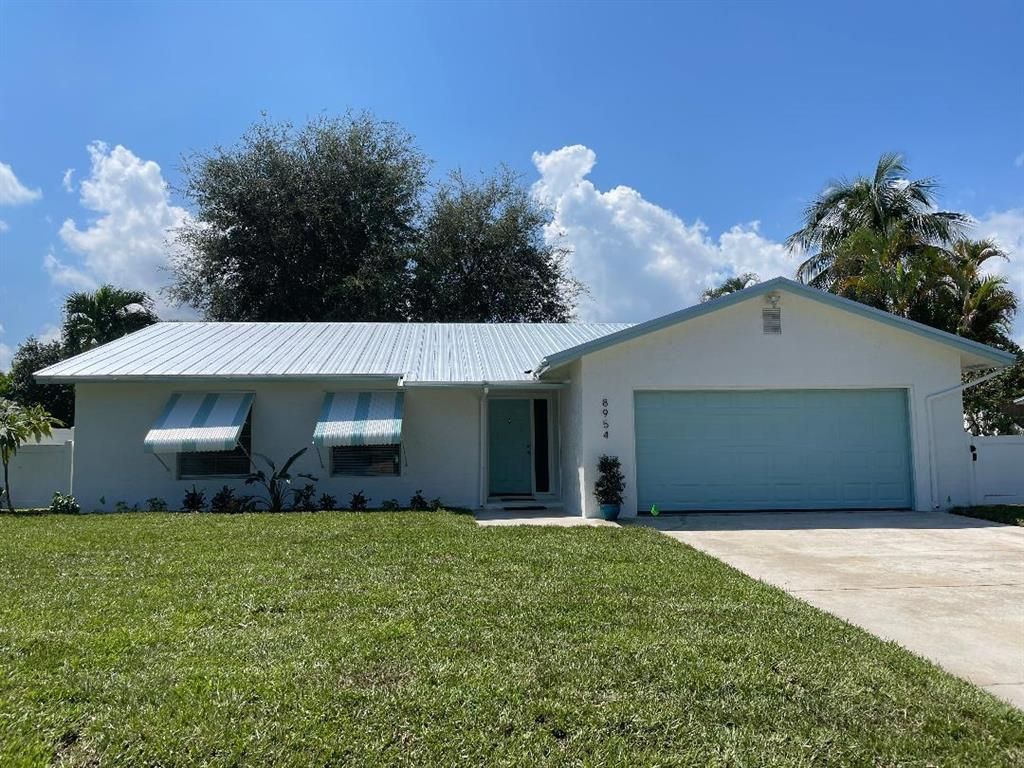 Photo of 8954 SE Bobo Court Ct, Hobe Sound, FL 33455 (MLS # R10835081)