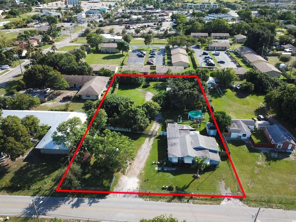 Photo of 3825 Lakewood Road, Palm Springs, FL 33461 (MLS # R10900327)