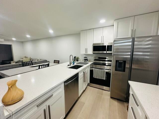 Photo of 2601 NE 3rd Court #1050, Boynton Beach, FL 33435 (MLS # B26091970)