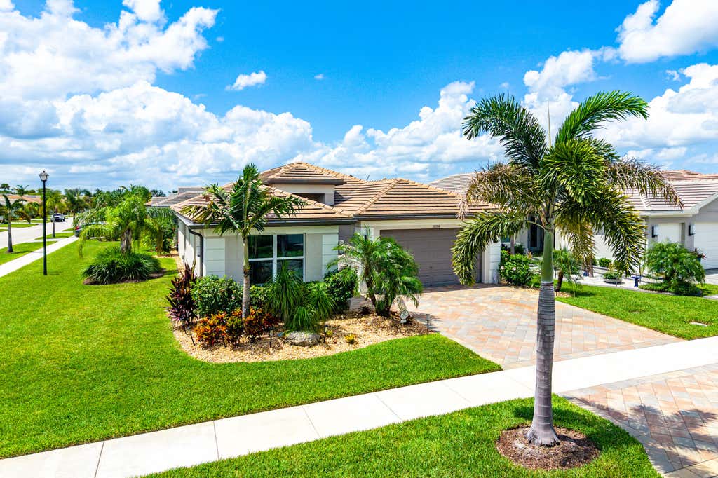 Photo of 12200 SW SANDPIPER Way, Port Saint Lucie, FL 34987 (MLS # B26056102)