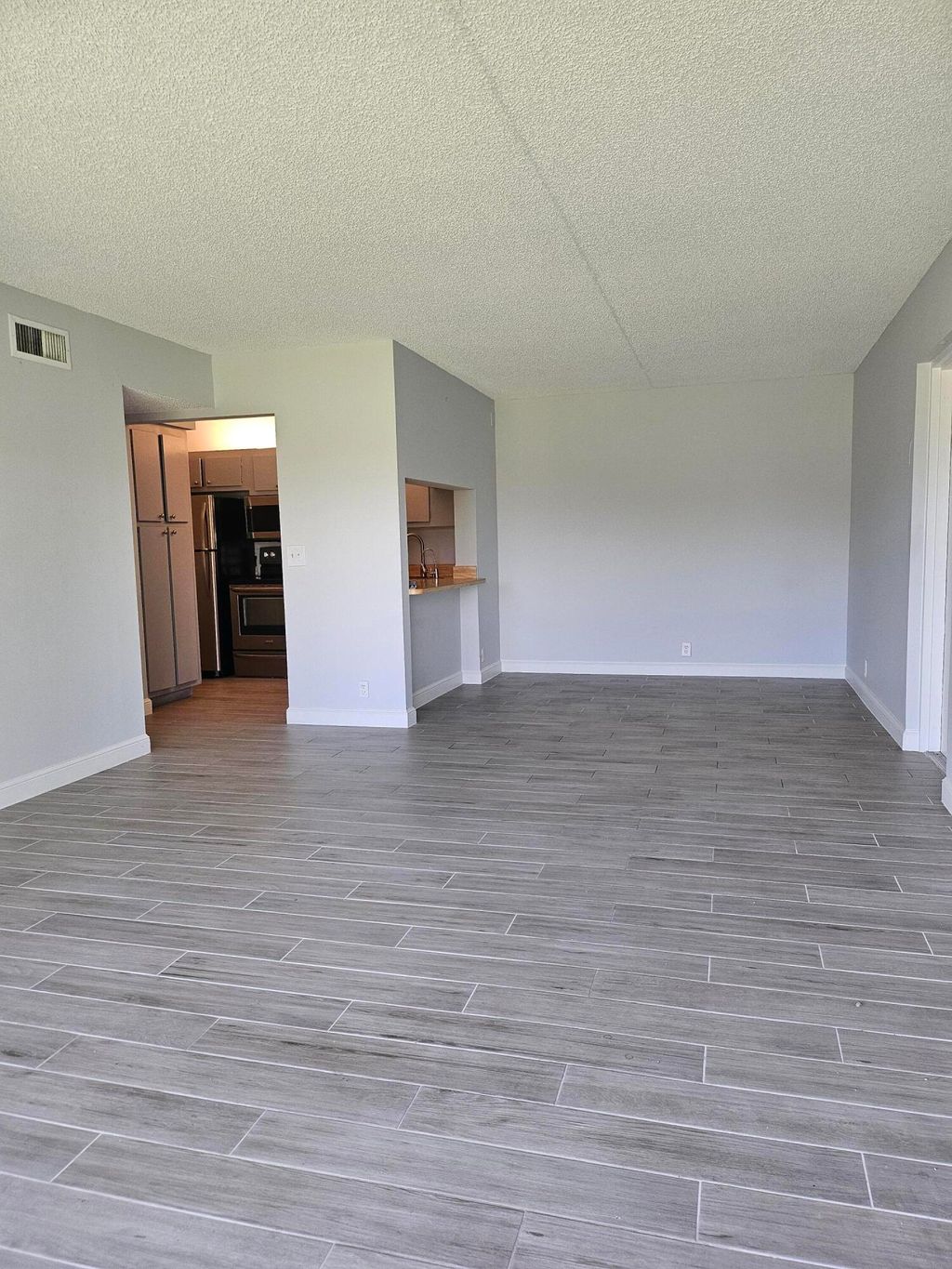 Photo of 811 Sky Pine Way #F2, Greenacres, FL 33415 (MLS # B26023109)