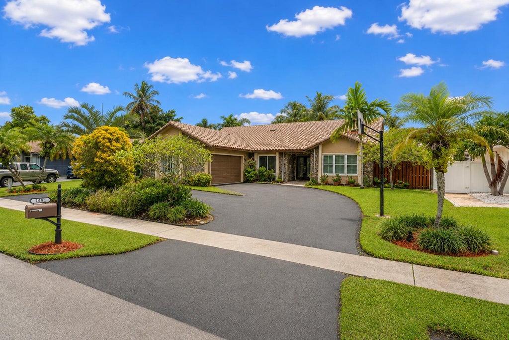 Photo of 1491 NW 99TH Avenue, Plantation, FL 33322 (MLS # B26058727)