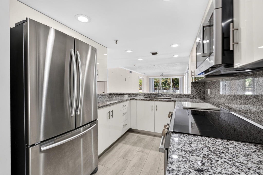 Photo of 3901 S Flagler Drive #204, West Palm Beach, FL 33405 (MLS # B26047153)
