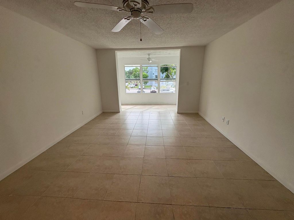 Photo of 2850 Somerset Drive #208l, Lauderdale Lakes, FL 33311 (MLS # B26011990)