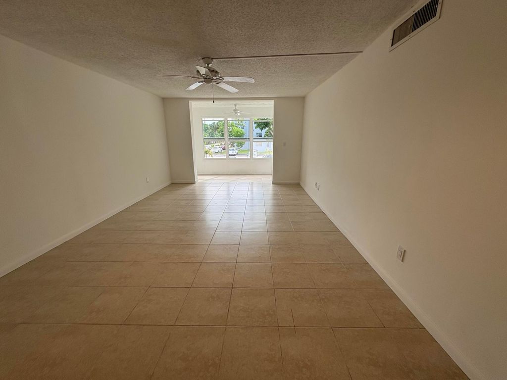 Photo of 2850 Somerset Drive #208l, Lauderdale Lakes, FL 33311 (MLS # B26011990)
