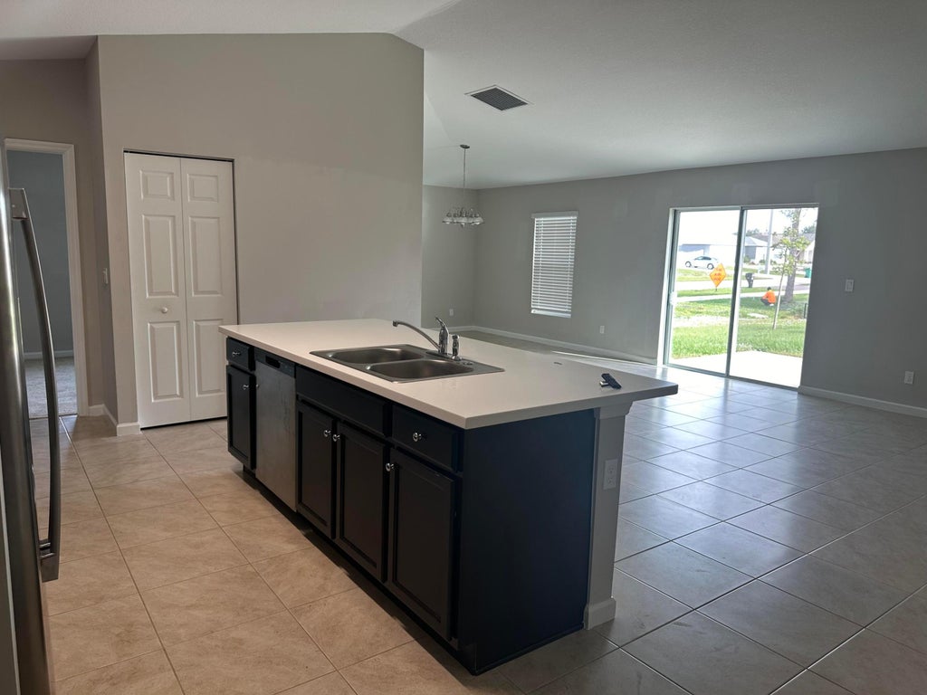 Photo of 4001 SW Kadlic Street, Port Saint Lucie, FL 34953 (MLS # R10912696)