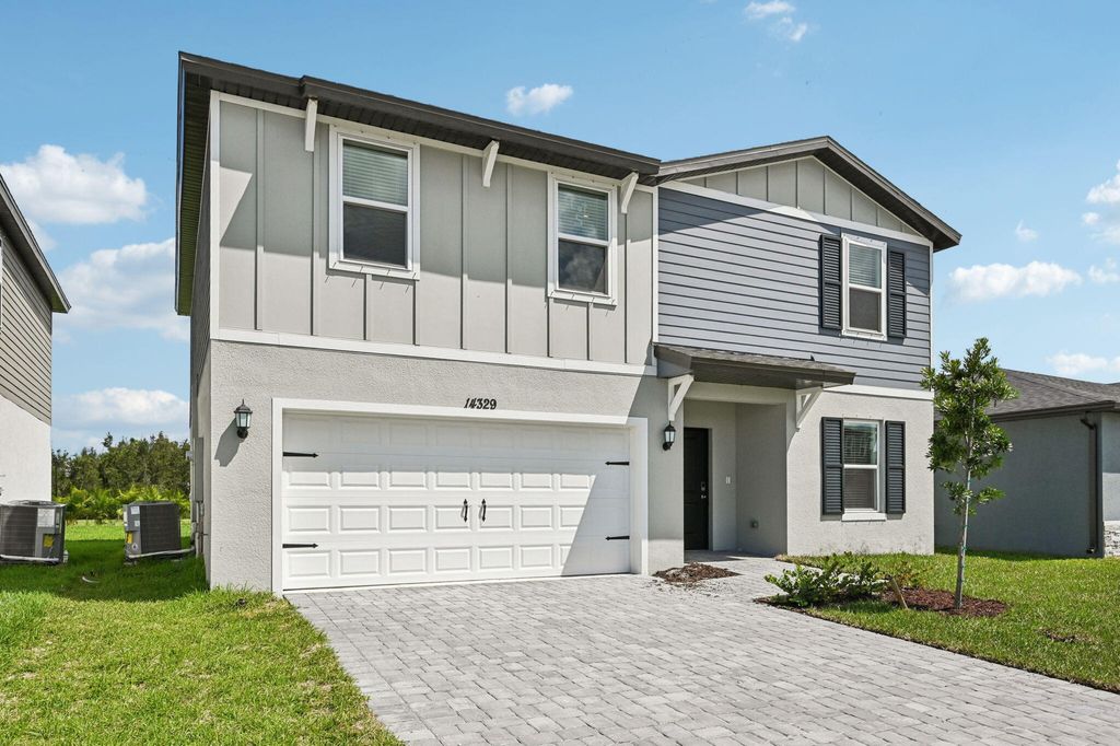 Photo of 14329 SW Rain Road, Indiantown, FL 34956 (MLS # R11102768)