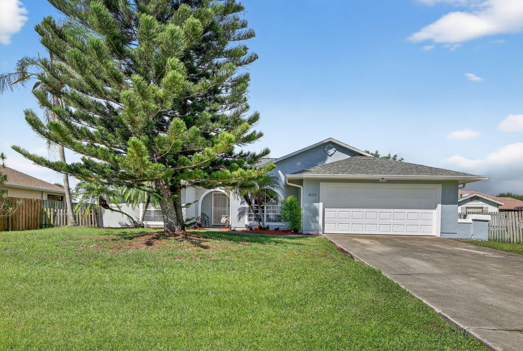 Photo of 1622 SE Nancy Lane, Port Saint Lucie, FL 34983 (MLS # R11141479)