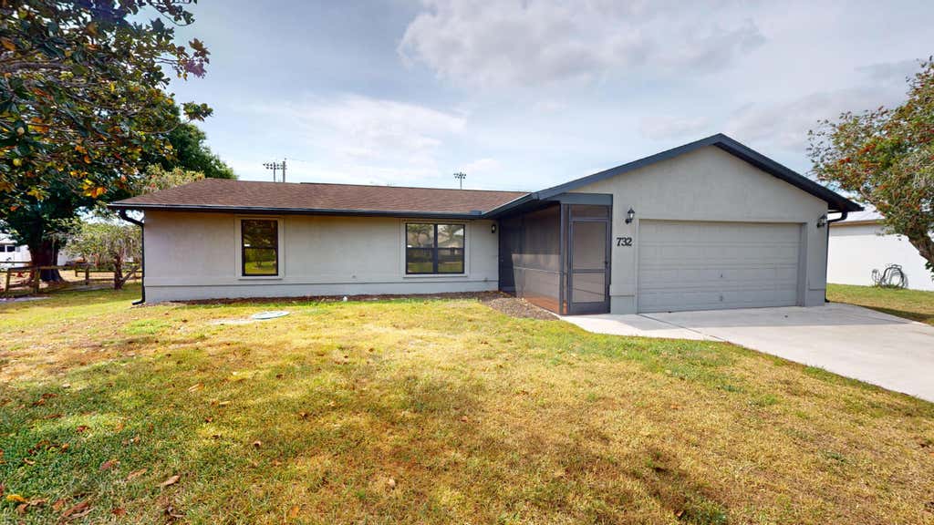 Photo of 732 SW Dolores Avenue, Port Saint Lucie, FL 34983 (MLS # R10977192)