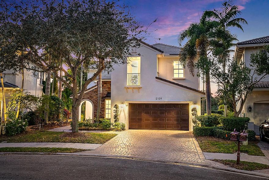 Welcome to this beautifully updated residence located in the Audubon Signature Sanctuary community of Evergrene in Palm Beach Gardens. Offering three spacious bedrooms, three full baths, and a thoughtfully designed layout, the home is ideal for both everyday living and entertaining. Upon entry, soaring cathedral ceilings and abundant natural light highlight two distinct living areas and an elegant formal dining space, while a versatile main-level den or home office provides flexibility for remote work or a quiet retreat. The chef's kitchen serves as the heart of the home, featuring a Thermador gas cooktop and refrigerator, a 50+ bottle wine refrigerator, and a generous center island with ample counter space - perfect for gathering with family and friends. Step outside to the screened patio for morning coffee or unwind on the open patio overlooking the tranquil lagoon, where peaceful water views and local birdlife create a serene setting. Notable upgrades include NEW hurricane impact windows, updated bathrooms, fresh exterior paint, a 16-KW generator, 2021 and 2025 HVAC systems, a 2025 water heater, and the added privacy of a quiet cul-de-sac location. Evergrene offers a private, gated lifestyle with resort-style amenities, including a lakefront clubhouse, Olympic-size pool, tiki restaurant and bar, fitness center with aerobics and weight rooms, basketball, playground, volleyball, and pickleball courts- delivering an effortless balance of refined living, everyday functionality, and peaceful natural​​‌​​​​‌​‌​​​‌‌​​​‌‌‌​​‌​​‌‌​​​​ surroundings.