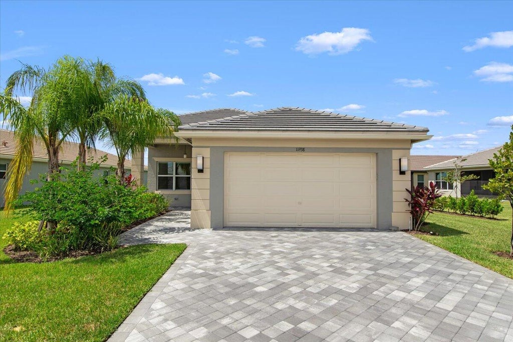 Photo of 11938 SW Seaway Street, Port Saint Lucie, FL 34986 (MLS # R11053113)