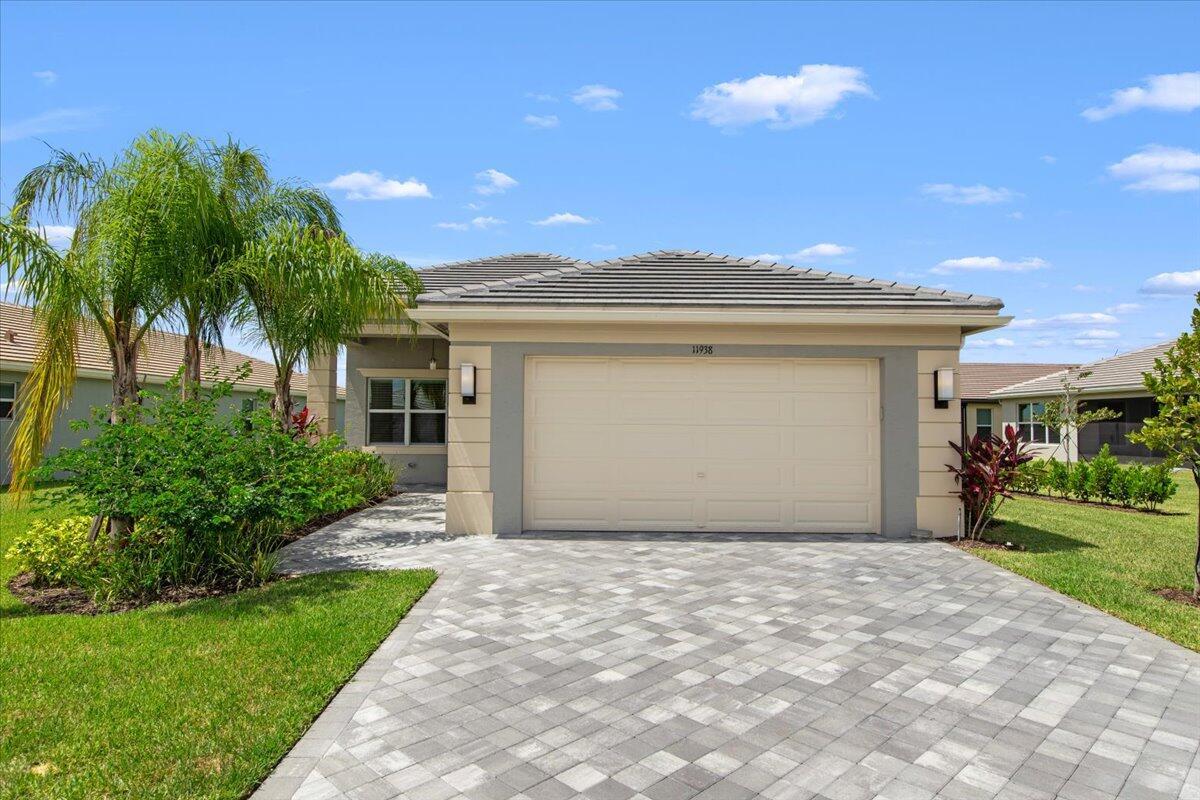 For Rent: Stunning Home in Riverland Community - Immediate Occupancy!Experience the vibrant lifestyle of the Riverland community in this beautifully maintained, one-year-old Tribeca model, now available for rent. This 2,254 sq. ft. home offers 3 bedrooms, 2.5 bathrooms, and a versatile den that can double as a 4th bedroom. The open-concept design includes a gourmet kitchen with wood cabinetry and granite countertops, seamlessly flowing into a spacious great room perfect for entertaining. The primary suite boasts two walk-in closets, and the screened lanai offers breathtaking water views and breathtaking sunsets.Enhanced with extra outlets and internet wiring, the home is ideal for a fully equipped home office. Located in the sought-after Valencia Grove community,