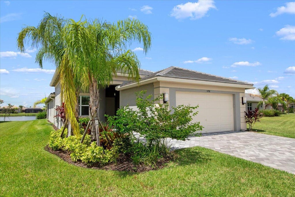 Photo of 11938 SW Seaway Street, Port Saint Lucie, FL 34986 (MLS # R11053113)