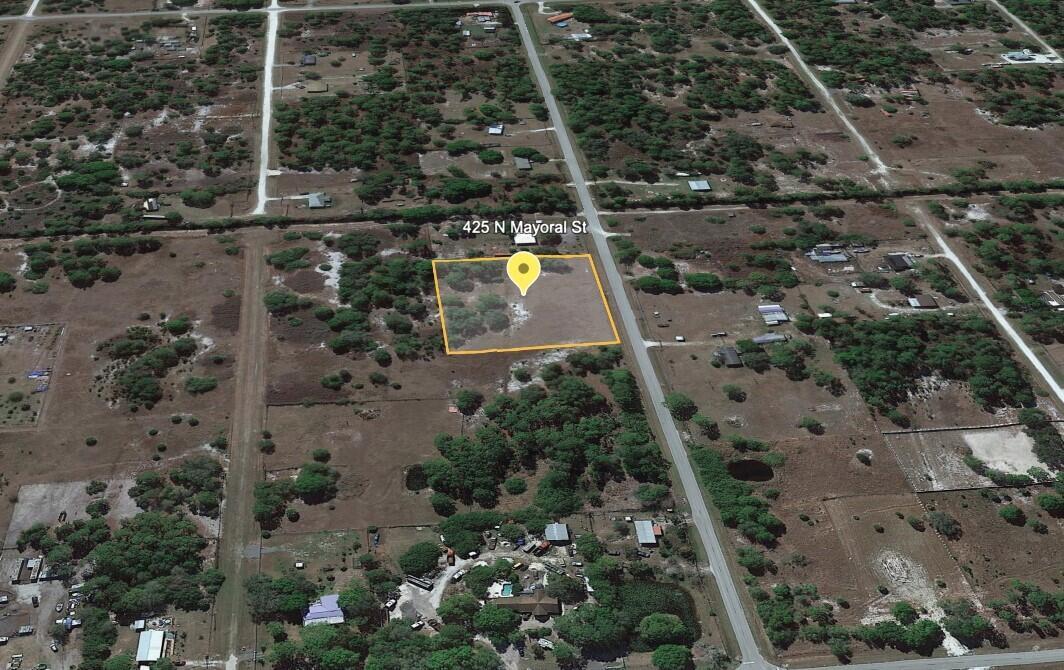 Build or bring your dream home and barn on this oversized high and dry semi cleared lot totaling 2.18 acres (two adjacent 1.09 acre lots being sold together) NO IMPACT FEE in this residential/farm & equestrian community of Montura Ranches. This property is located just minutes West of Lake Okeechobee. There is easy access to US 27. Montura Ranches is a great community with a Club House, community pool and park play area in the peaceful City of Clewiston! Not in an HOA, so park your boat or RV outside your home. Enjoy this rare country setting but still close to shopping, restaurants, and recreation activities. Minutes to Lake Okeechobee Park which it's popular for its 400-foot fishing pier. Located a little over an hour from Miami, West Palm and Broward