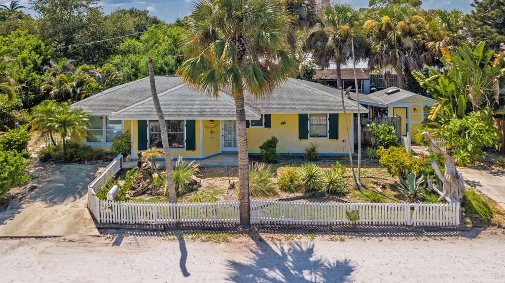 Photo of 1076 NE BANYAN TREE Drive, Jensen Beach, FL 34957 (MLS # B26069812)