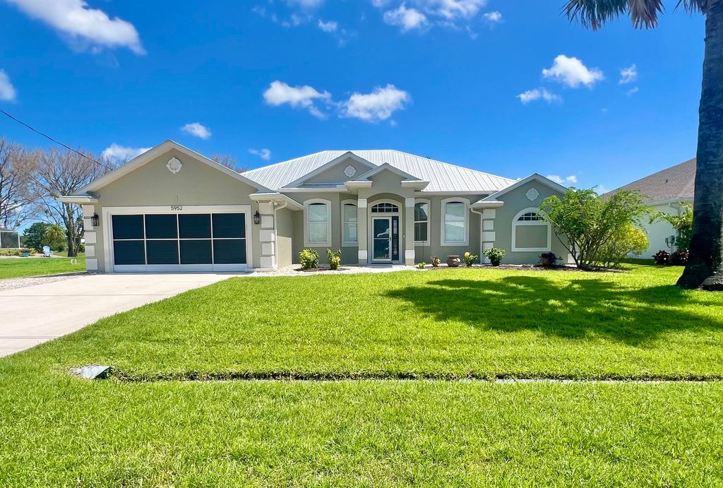 Photo of 5952 NW Favian Avenue, Port Saint Lucie, FL 34986 (MLS # B26000687)
