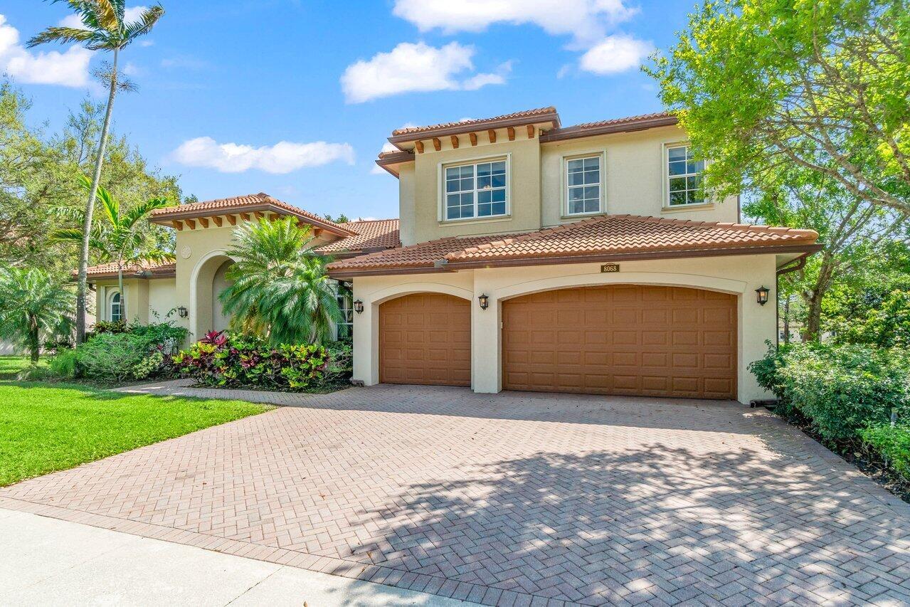 Secluded in a gated community of just 24 homes, this 5 Bedroom 4 Bathroom 3 car garage pool home features a lake view giving way to luxury & privacy in a tranquil setting.Your primary bedroom is on the first floor with en suite,double walk-in closets, & beautiful water views along with a second bedroom & full bath providing flexibility to use as a first floor office or guest suite. You'll immediately notice the 10'-23' tall ceilings highlighted with crown molding & expansive windows providing an abundance of natural light.Your formal dining & living room are off the entry.The open family room and kitchen make this an inviting home for family & prime for entertaining.Kitchen features stainless steel appliances, a bar, & an island. upstairs you have a loft with 3 additional bedrooms