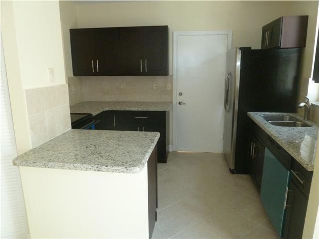 Photo of 10525 NW 57th Court #10525, Coral Springs, FL 33076 (MLS # B26017548)