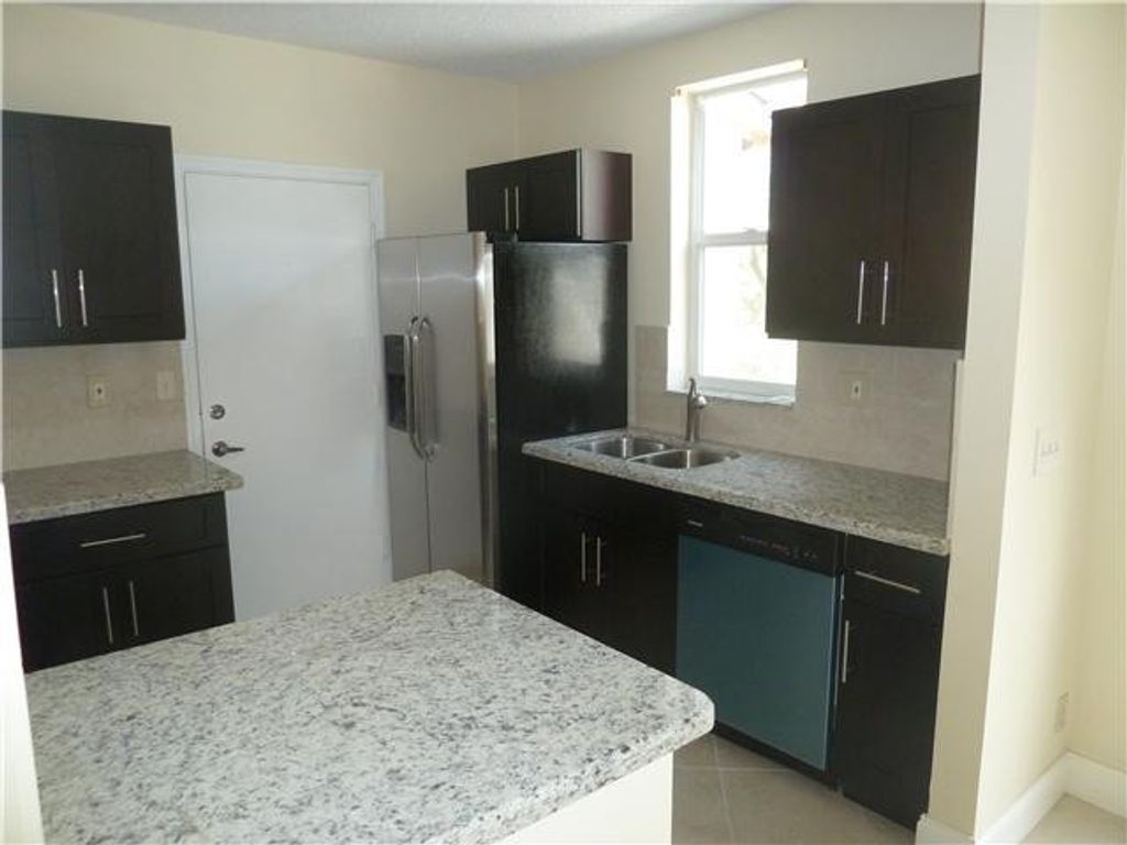 Photo of 10525 NW 57th Court #10525, Coral Springs, FL 33076 (MLS # B26017548)