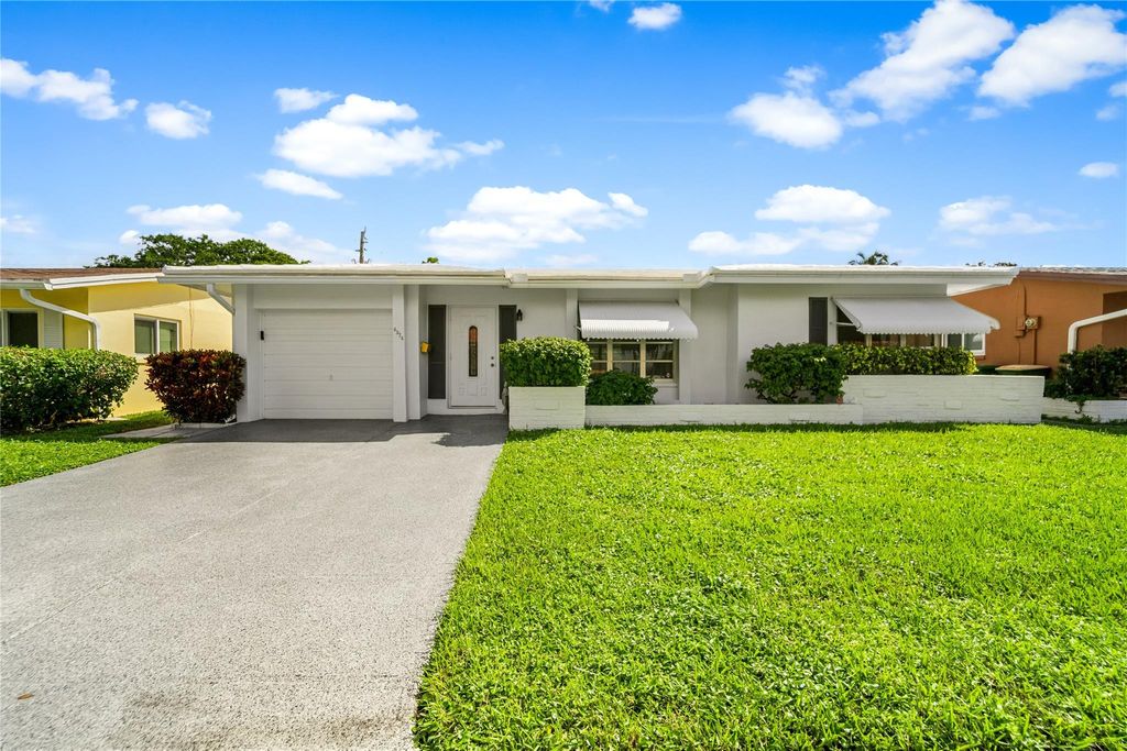 Photo of 4524 NW 43rd Ave, Tamarac, FL 33319 (MLS # F10531708)