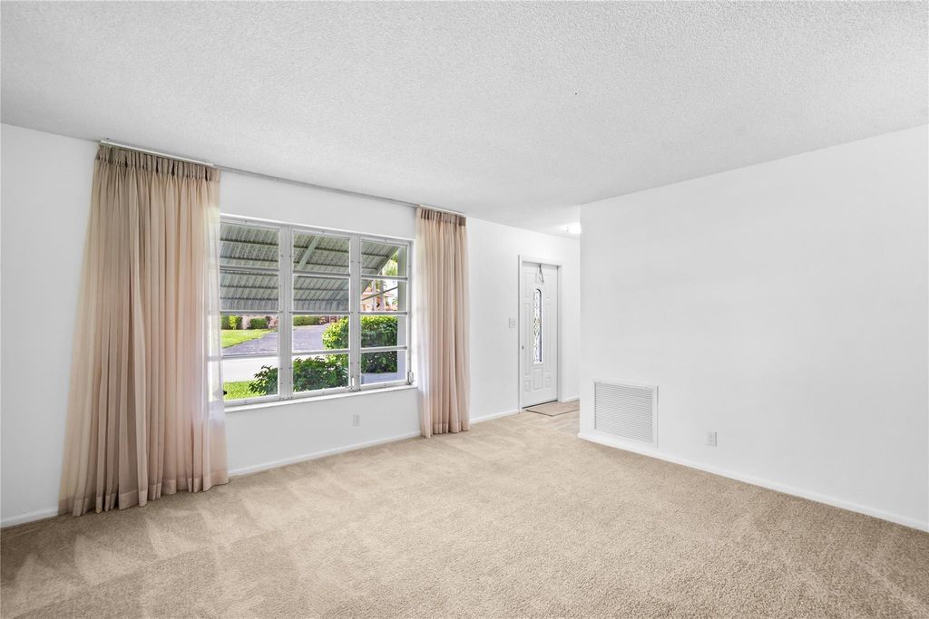 Photo of 4524 NW 43rd Ave, Tamarac, FL 33319 (MLS # F10531708)
